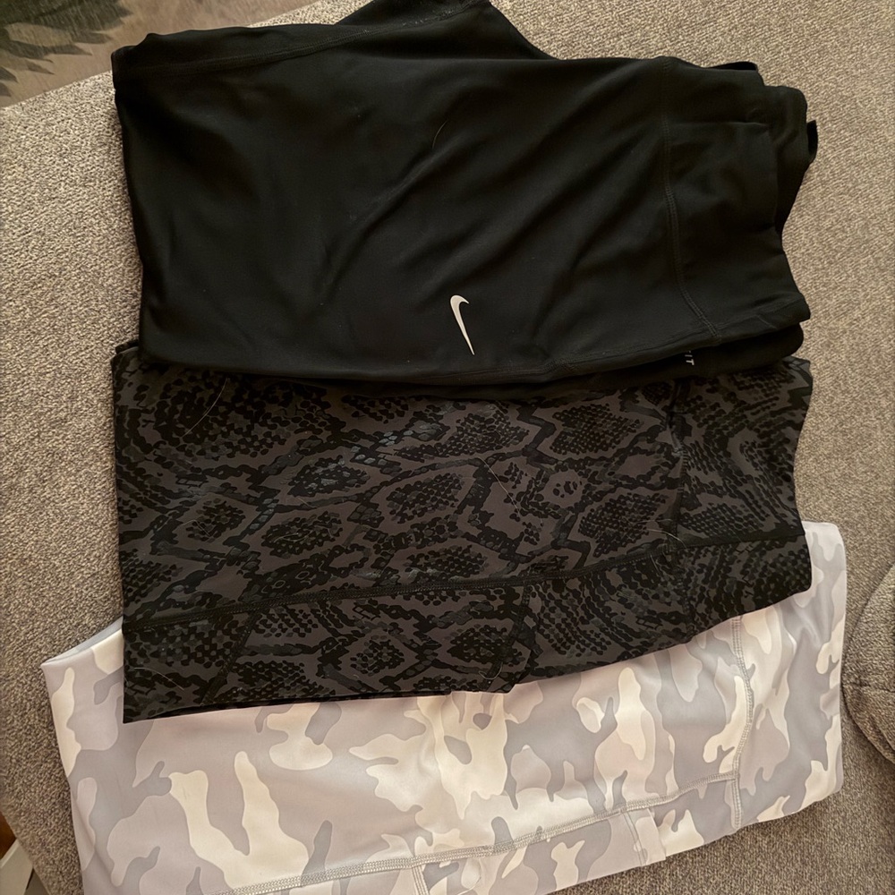 Nike Black, Gray Camouflage, and Snakeskin Leggings Trio
